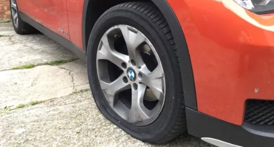 Can I drive with a flat tyre?